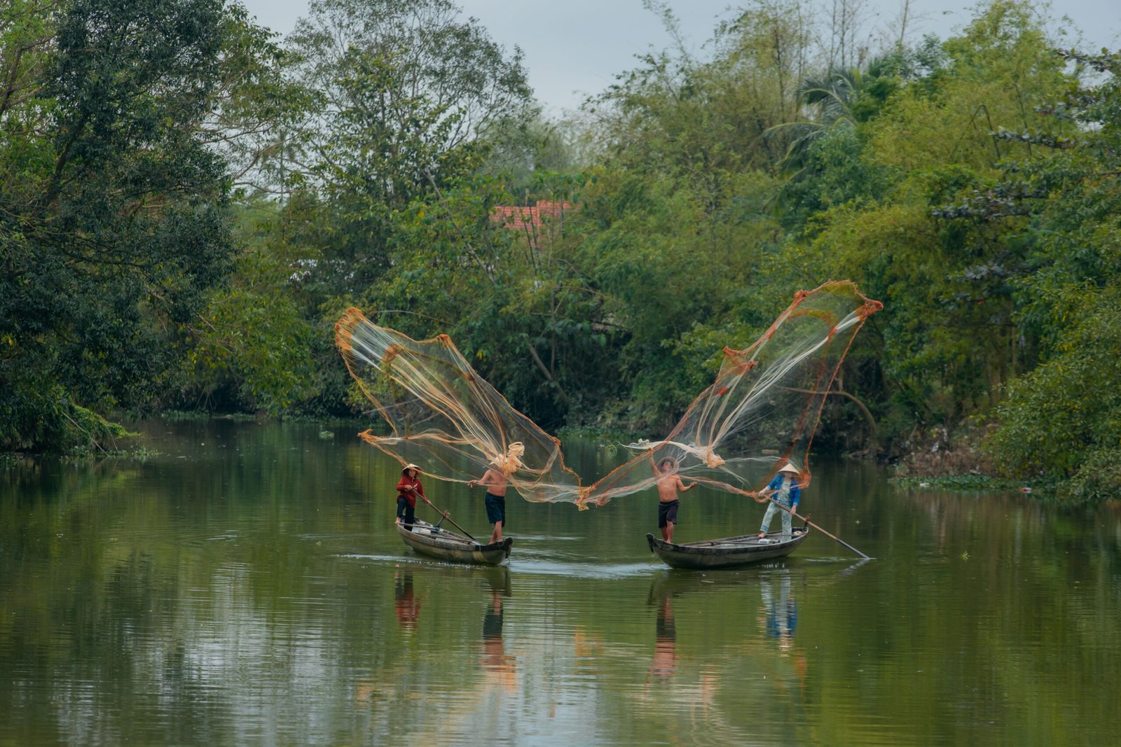 Experience Local Fishing Techniques on the Hoang Long River
