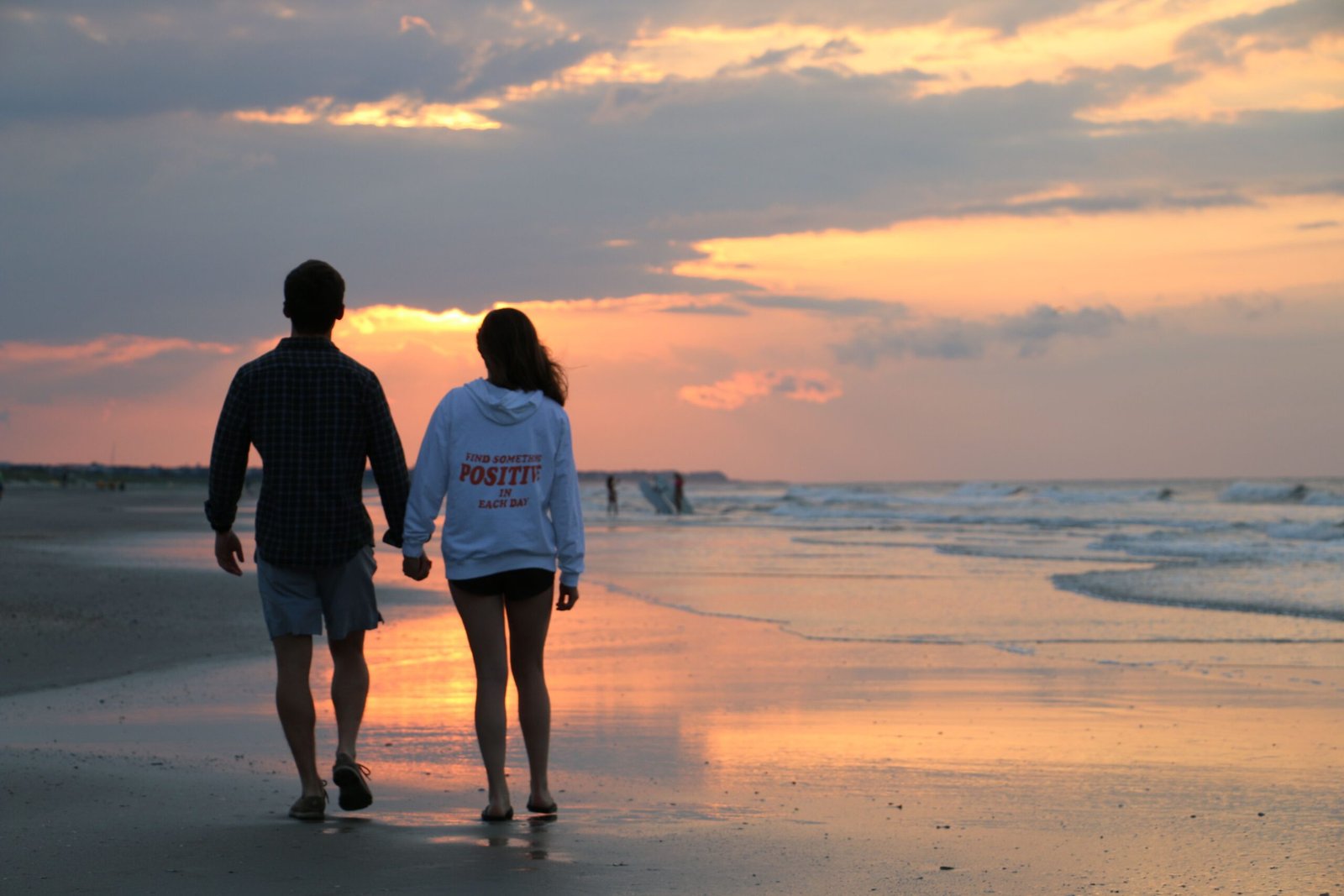 Stroll Hand-in-Hand Along St. Augustine Beach at Sunset