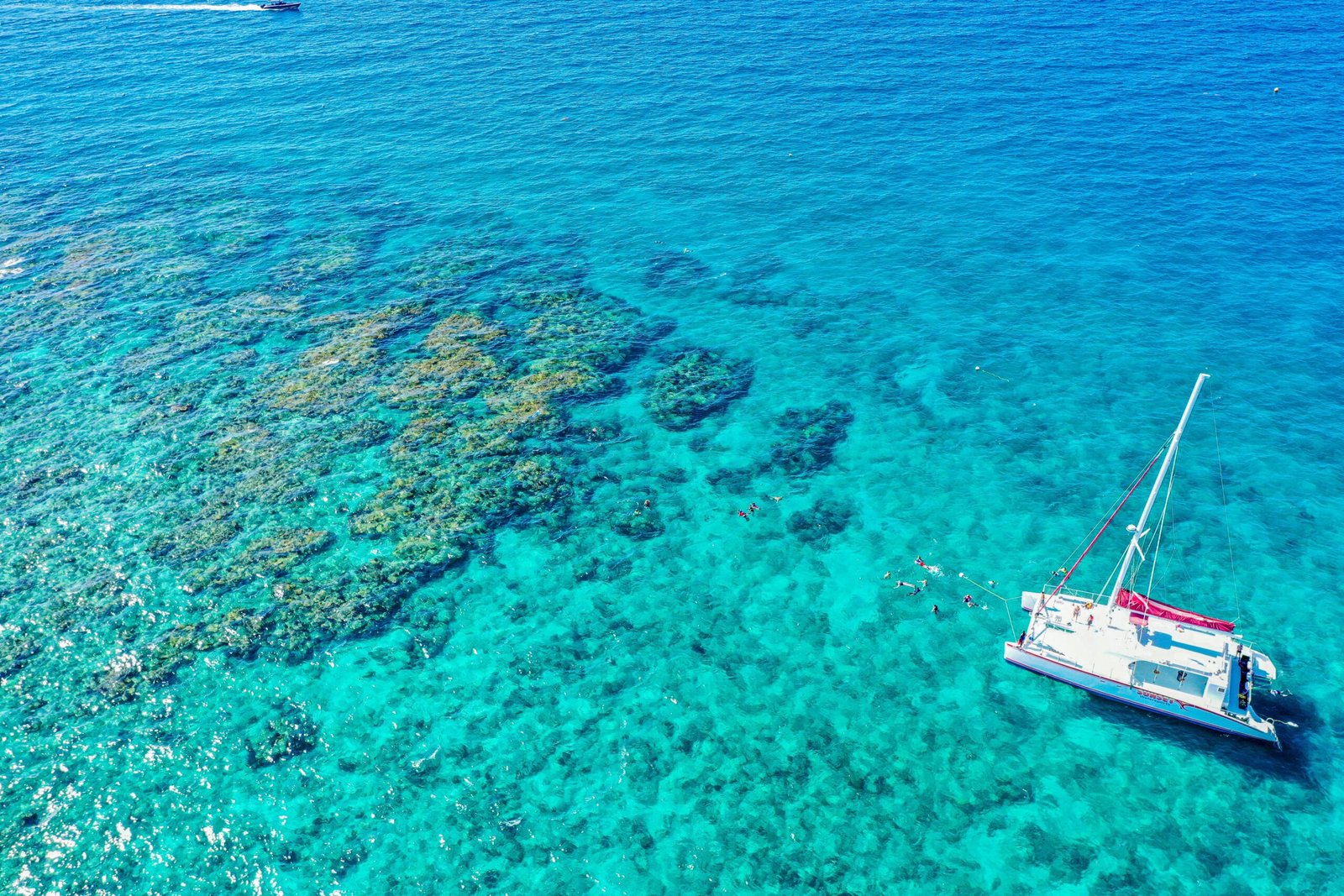 Explore the Picturesque Island Aboard a Sunset Catamaran Cruise
