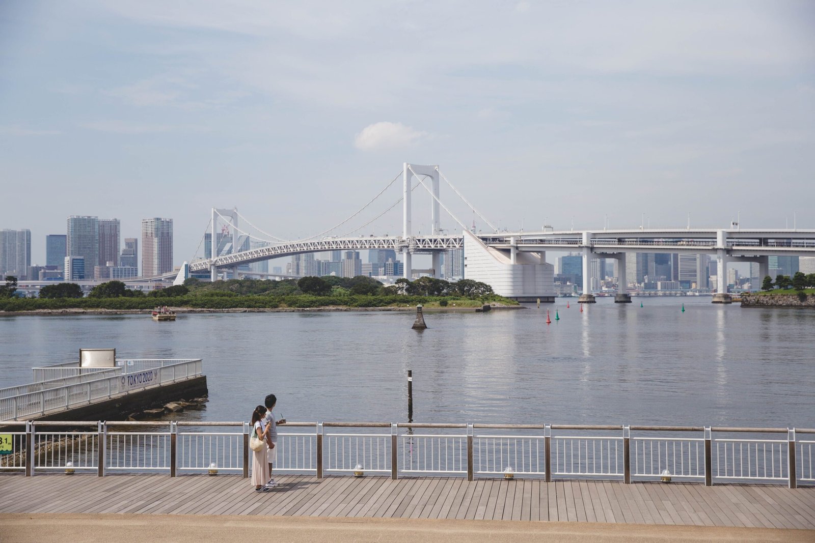 take a quick selfie with the giant rainbow bridge backdrop harajuku