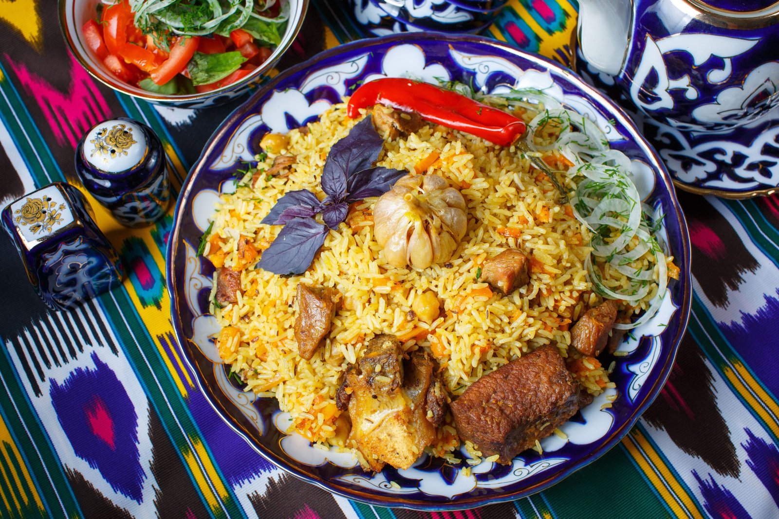 Enjoy a traditional Uzbek plov meal at a local restaurant in Tashkent