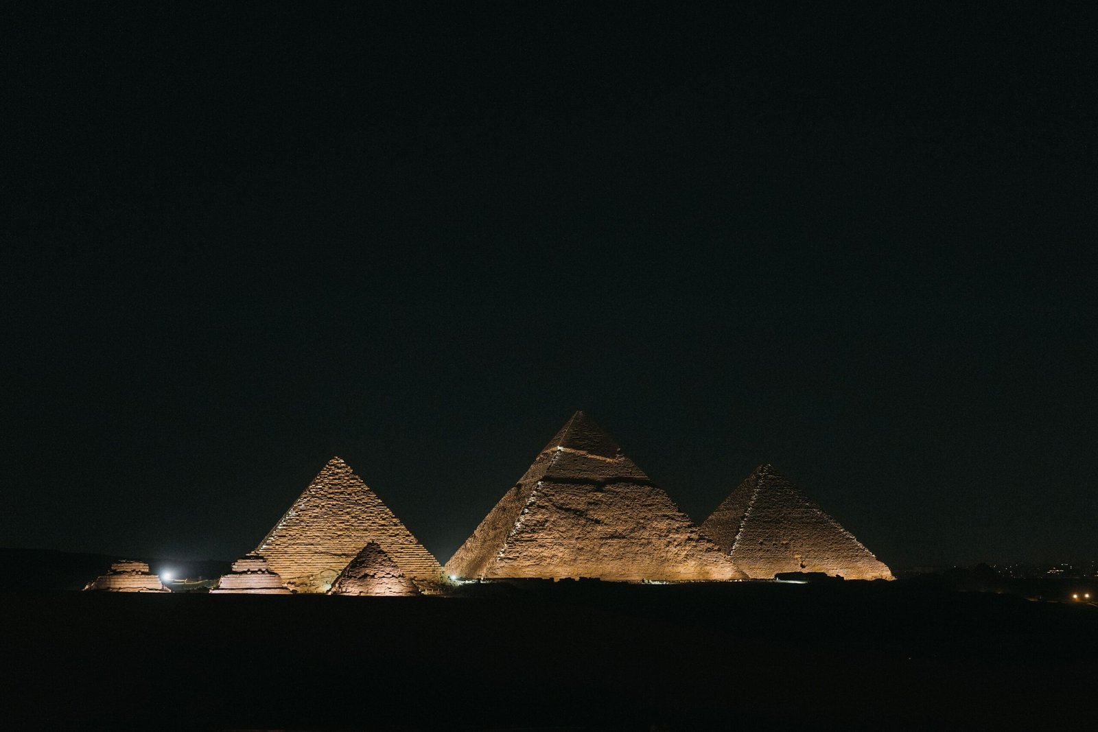 Experience the sound and light show at the Pyramids of Giza