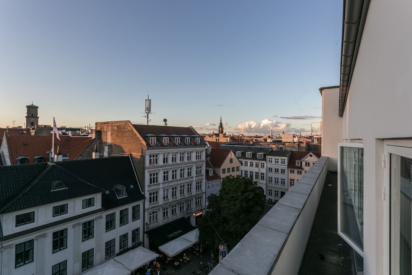 Visit the rooftop bar at the Thompson Hotel for stunning views of the city